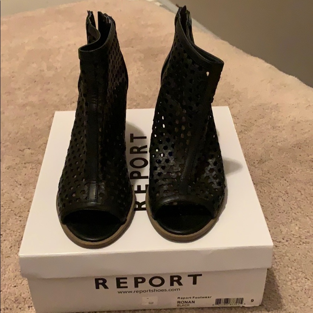 Black peep toe booties by Report